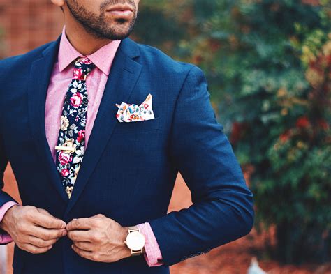 dark blue suit pink shirt.